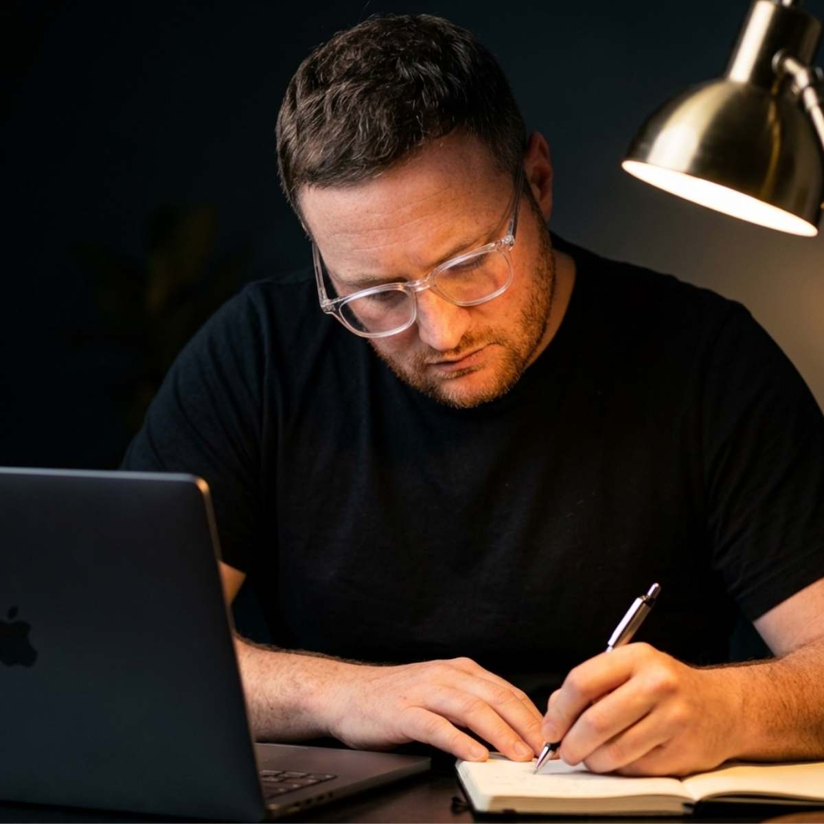 Ben Evans, founder of JHA Media, working at his desk